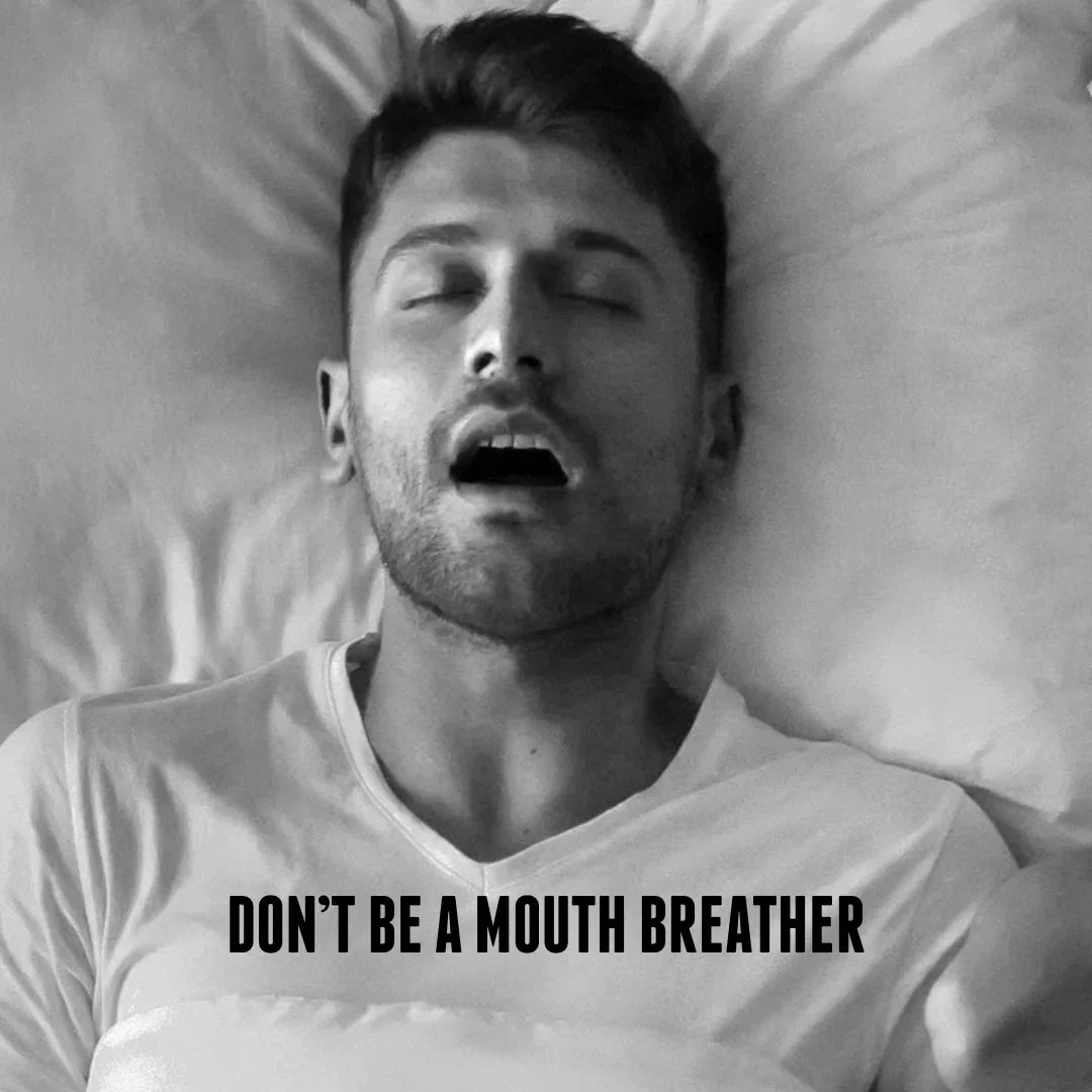 Man lying in bed with mouth open; on-image text reads “Don’t be a mouth breather”