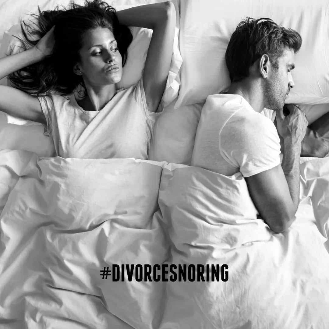 Frustrated woman in bed beside snoring man with hashtag #DIVORCESNORING