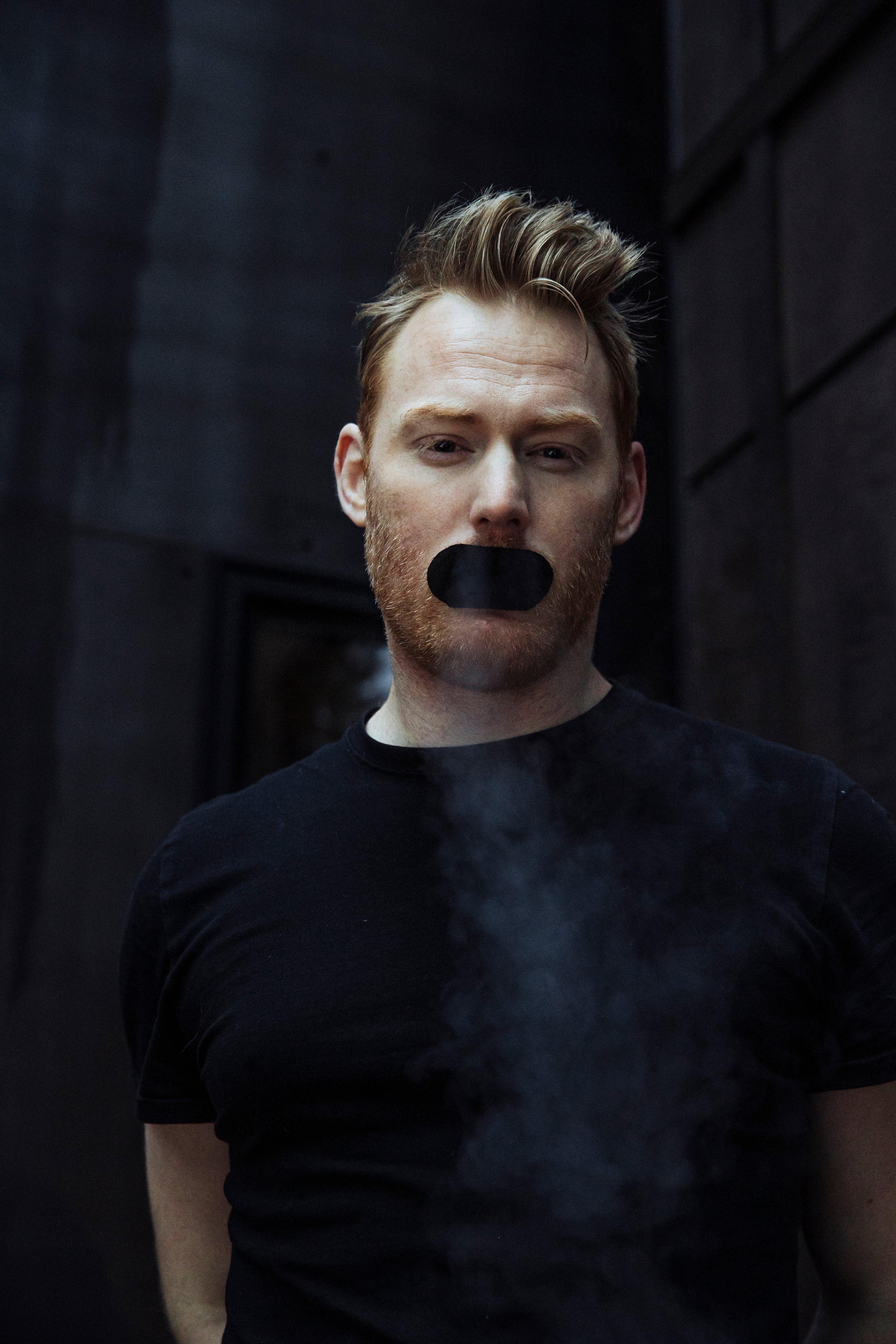 Man wearing Hostage Mouth Tape