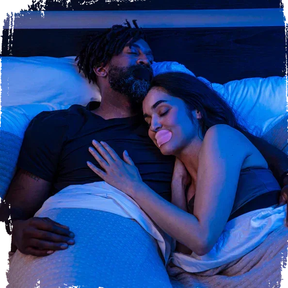 Man and woman sleeping peacefully with Hostage Mouth Tape