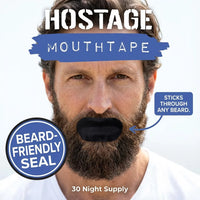 Man with beard wearing 'Hostage Mouthtape' with text and graphics on a white background