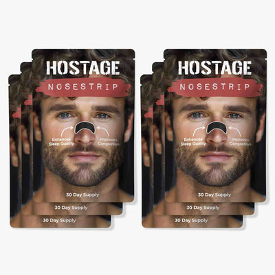 six packages of Hostage Nosestrip on a white background