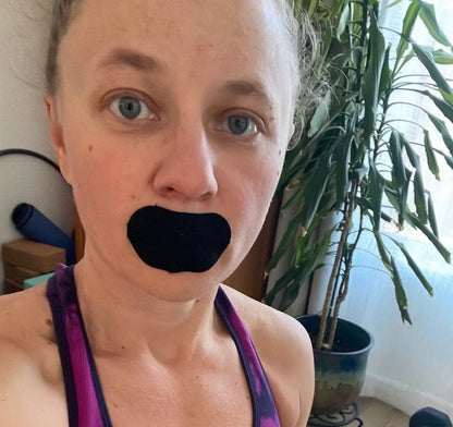 Active woman wearing Hostage Mouth Tape to improve nasal breathing and sleep quality