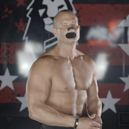 Andy Elliott wearing black Hostage Mouth Tape and Nose Strips for improved sleep