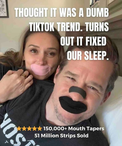 Smiling couple wearing black and pink Hostage Tape for better sleep and nasal breathing