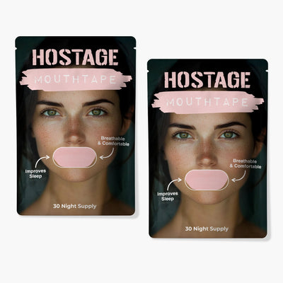 Two pink Hostage Mouth Tape pouches