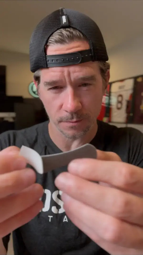 Step 2: Peel the backing from the Hostage Nose Strip