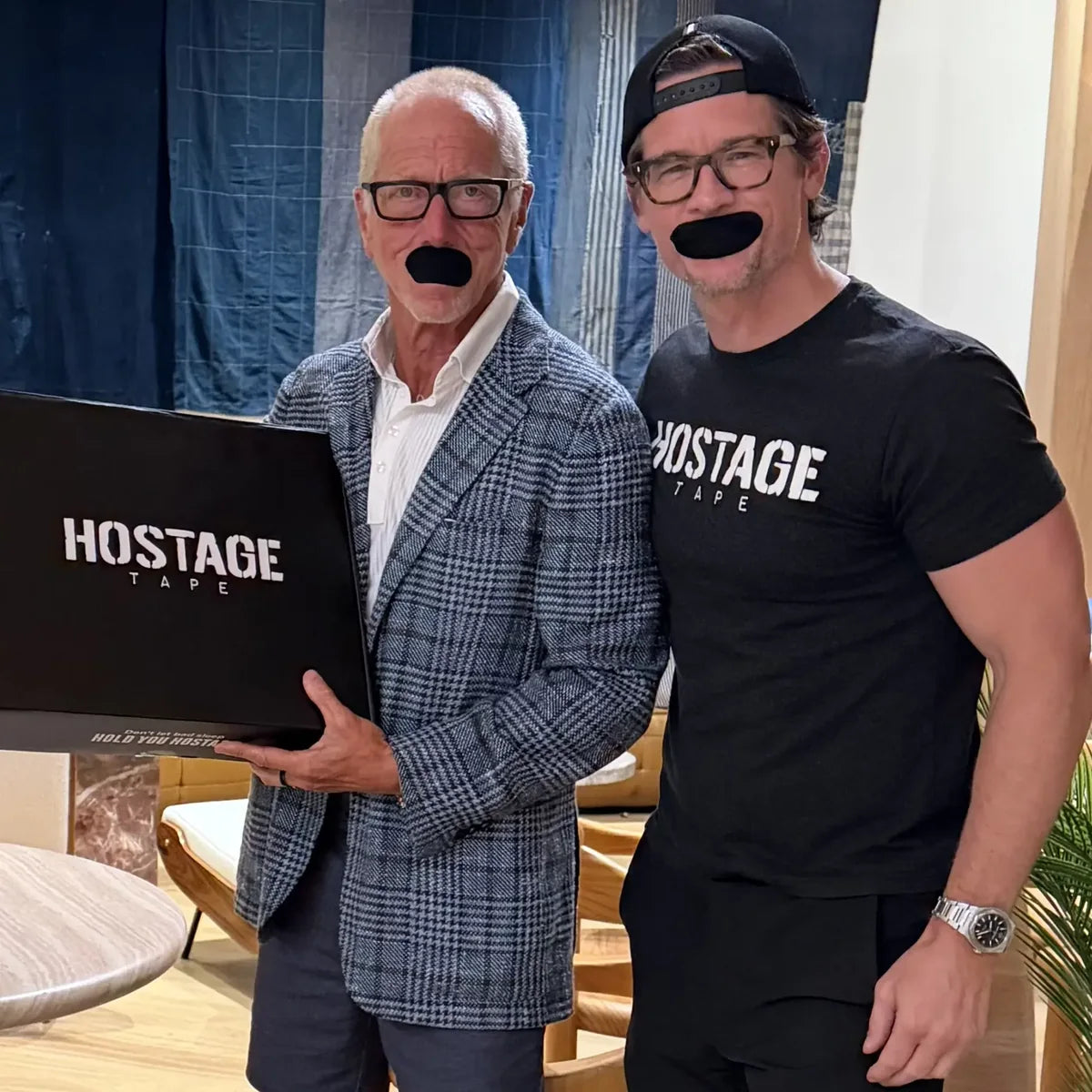 Alex Neist delivering a Hostage Tape box to the customer who paid for founder delivery